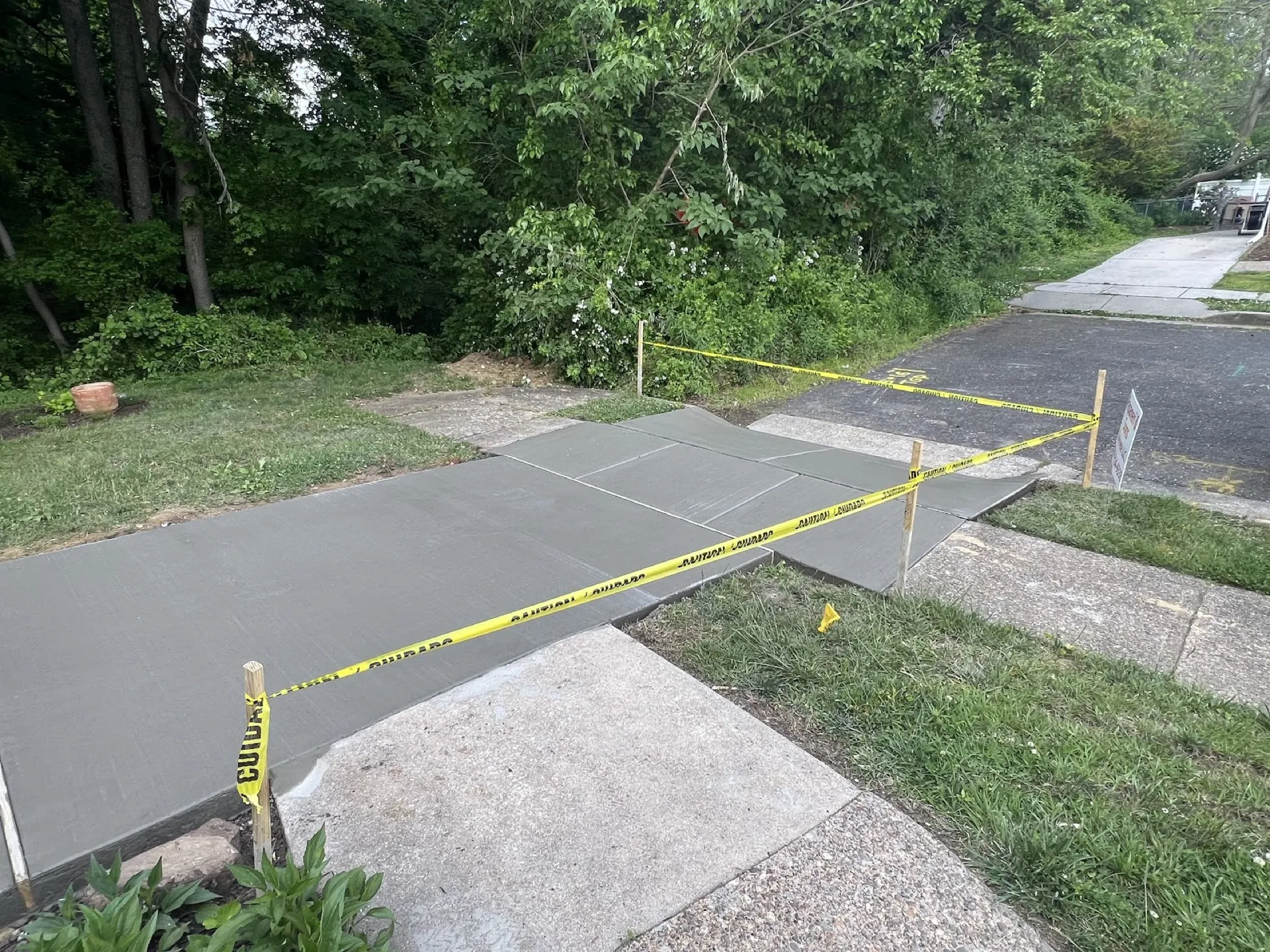 Concrete sidewalk repair replacement fresh pour curing Cherry Hill NJ