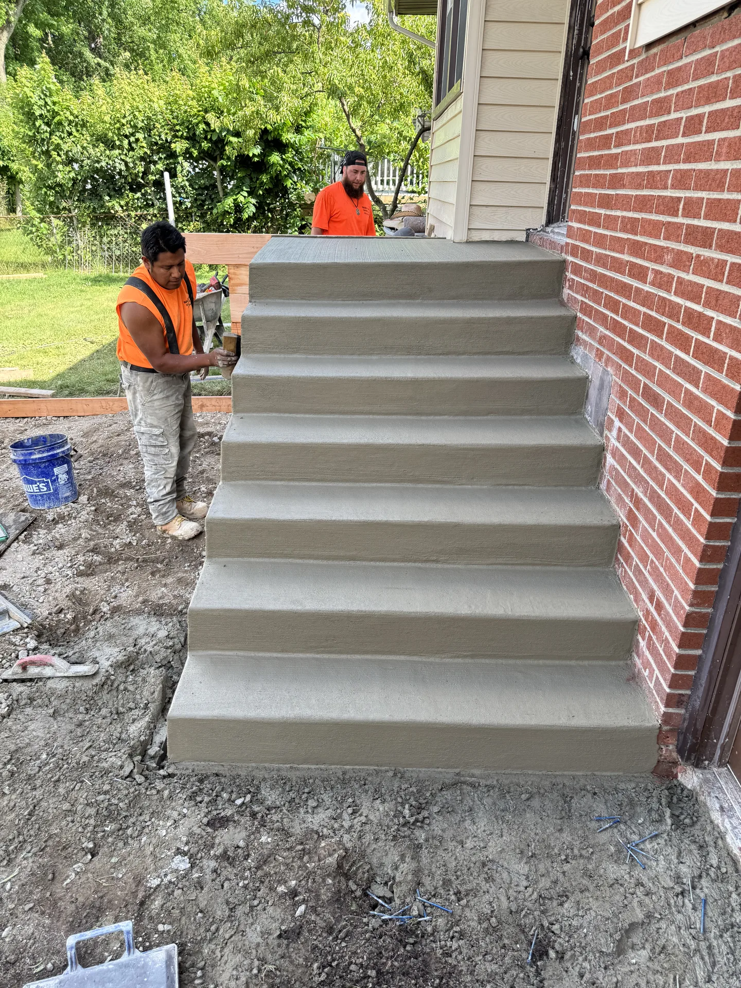 Papaneri crew finishing fresh concrete steps in Cherry Hill, NJ