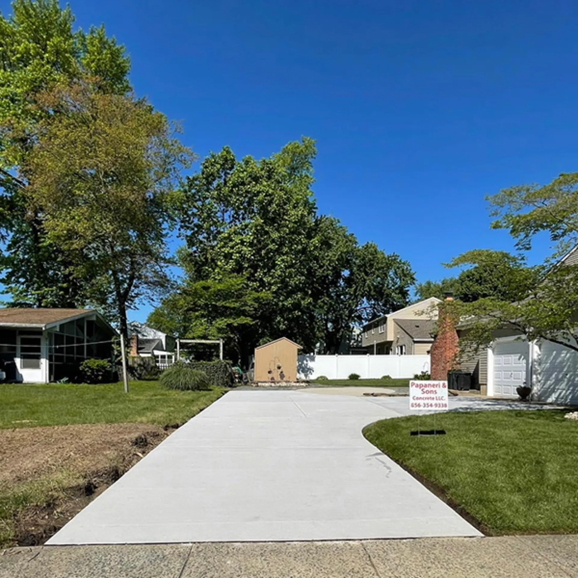 Finished concrete driveway and two-car-garage home in Cherry Hill NJ
