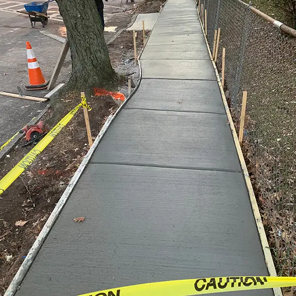 Backyard concrete patio completed at residential home Cherry Hill NJ
