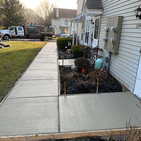 Concrete sidewalk replacement installed at residential corner Cherry Hill NJ