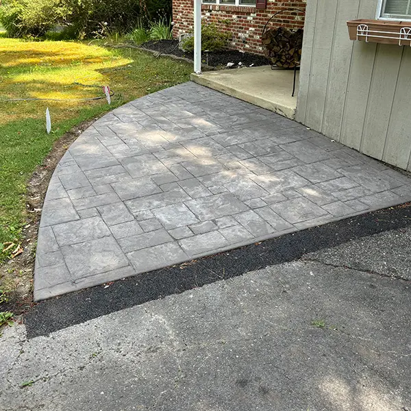 Stamped concrete driveway with decorative pattern installed Cherry Hill NJ
